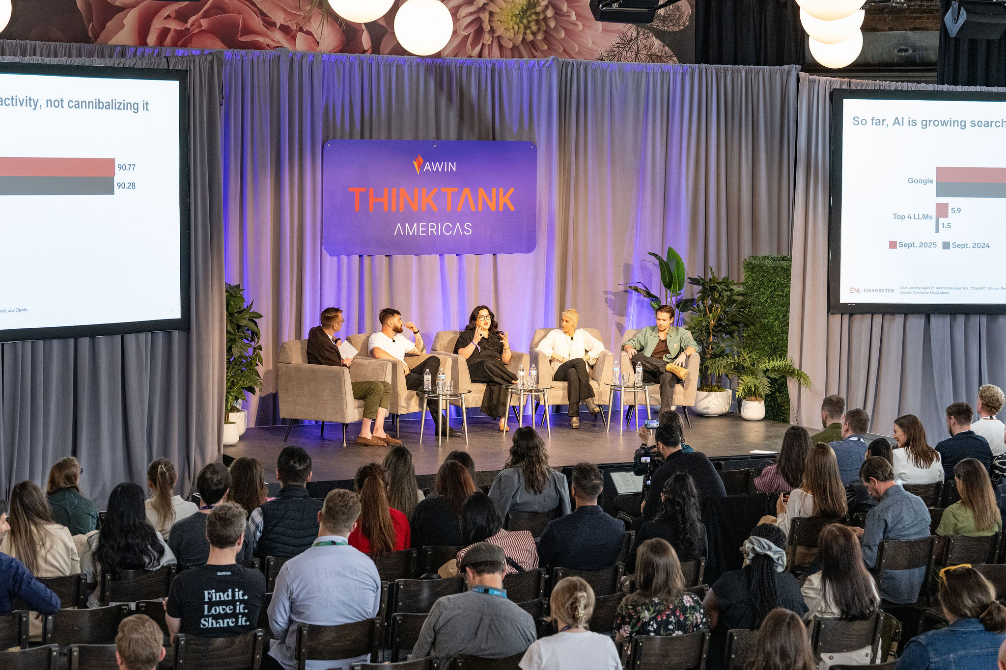 Marketing leaders sit on a stage during a panel at ThinkTank Americas 2026 in Chicago. An audience sits in front of them on folding chairs