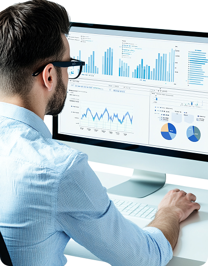 A personal finance influencer checks data and graphs on his computer screen